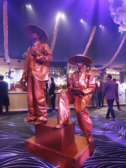 Theatrical elements like these human statues add a layer of interactive art and surprise to our events, making the experience truly memorable.