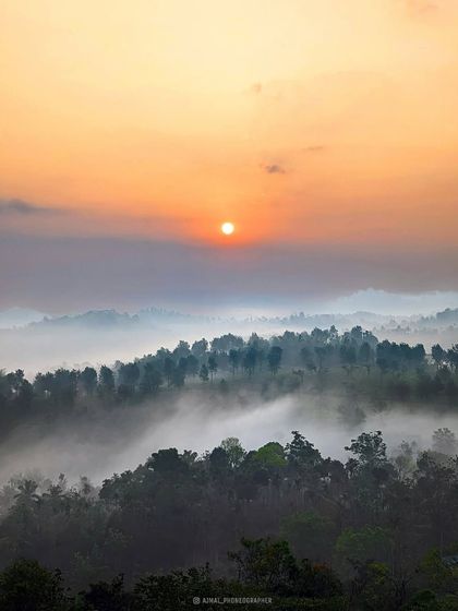 A spectacular sunrise over a sea of clouds in Wayanad. We start our days early to catch these magical views.