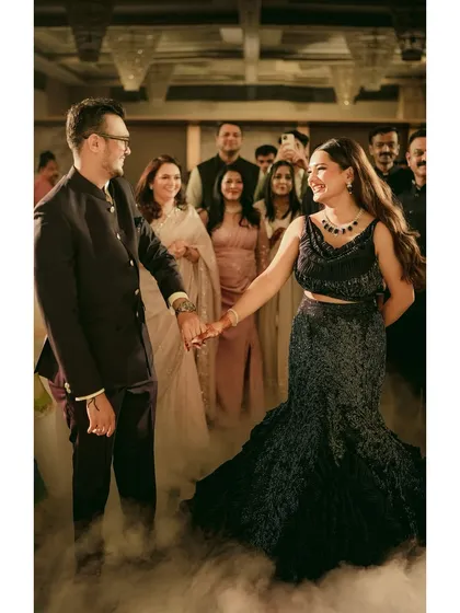 A magical first dance moment. Isha's makeup was designed to catch the light beautifully as she moved, ensuring she looked flawless all evening.