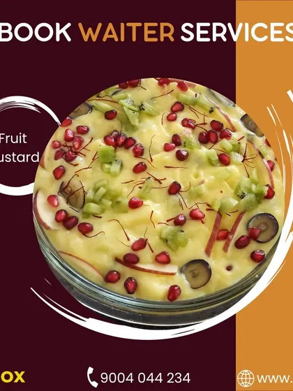 End your meal on a sweet and refreshing note with our fruit custard. It's a light and creamy dessert, generously topped with seasonal fruits like pomegranate and kiwi.