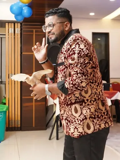 A dove seems to levitate right out of my hands. This is a beautiful and gentle moment of animal magic that captivates audiences.