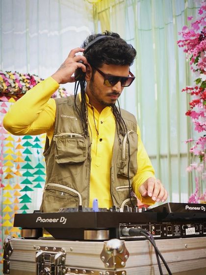 In my element at a Haldi ceremony, mixing tracks to match the fun and festive mood. I love being a part of these traditional pre-wedding celebrations.
