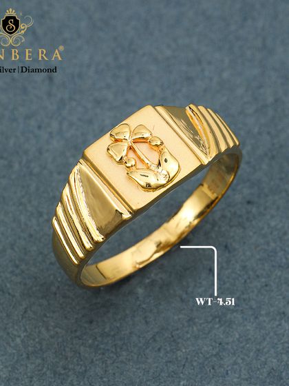 A classic men's gold ring featuring a delicate floral and leaf motif. Weighing 3.51 grams, this ring offers a touch of traditional design in a subtle and elegant form.