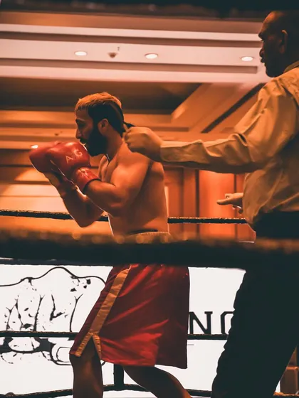 A moment of focus in the ring, with the referee giving instructions. This is where all the training comes together.