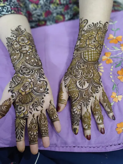 The same design as the previous image, but with a slightly different angle showing how the pattern flows from the wrist to the fingertips.