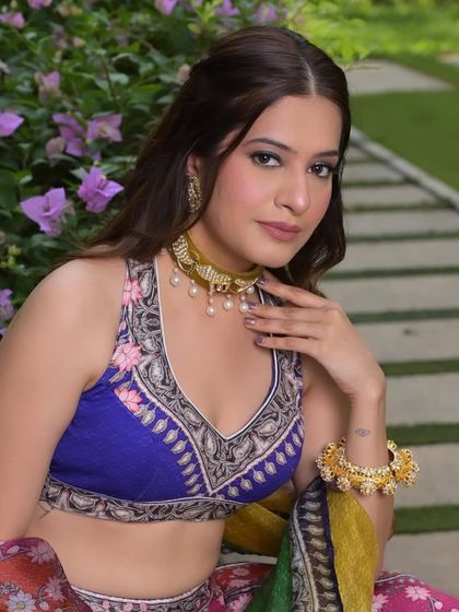 A beautiful portrait of the bride, looking fresh and festive for her mehendi ceremony.
