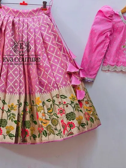A pink long-sleeved blouse and lehenga set, perfect for creating a custom mom-daughter twinning look.