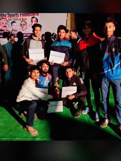 The team posing with their certificates and runner-up trophy. We celebrate every achievement, big or small, as a family.