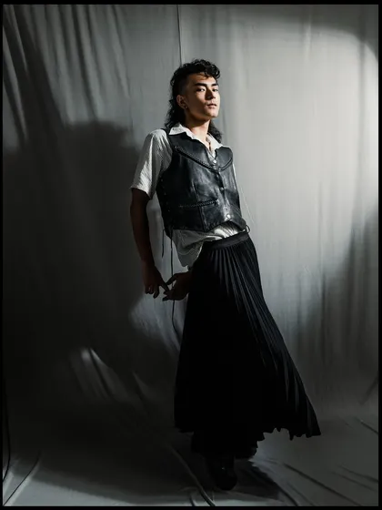 A dynamic pose from the same series, capturing movement and attitude.