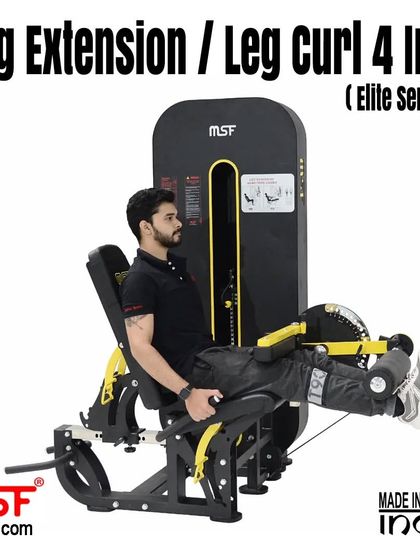 A user demonstrating the seated leg extension.