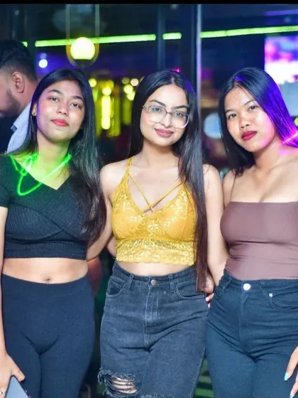 A stylish trio posing for the camera at Drava's Ladies Night.