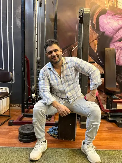 A candid shot in the gym. The environment here is all about focus and hard work.