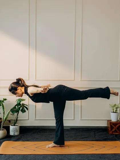 Virabhadrasana III (Warrior III) is a powerful expression of strength and focus. This pose builds incredible stability in the standing leg and core while teaching you to maintain a straight line of energy from heel to fingertips.