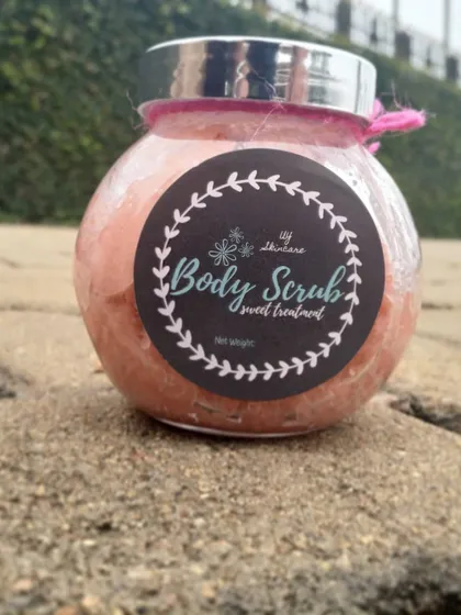 My sweet treatment Body Scrub in its glass jar. It’s formulated to gently remove dirt and dry, flaky skin.
