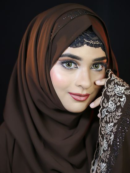 A full portrait of the Hijabi look, showing how makeup can beautifully complement modest fashion.