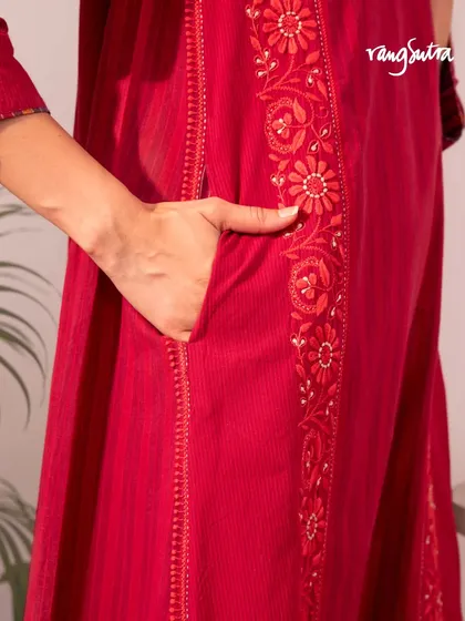 Our Haveli collection tells a story of heritage and craft. This detail shot shows the practical side pocket on our red Chikankari kurta, a feature we include in many of our designs.