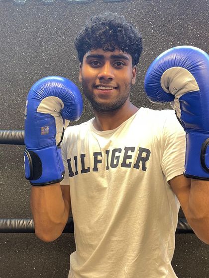 Ready to level up your fitness? This member is geared up for one of our reservation-only boxing classes. We offer both mini-group and personal training sessions to fit your goals.