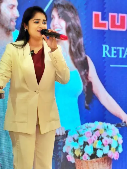 On stage for Lux Industries, with the brand's visuals prominently displayed. I ensure your branding is always front and center.