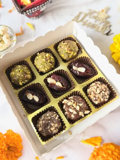 This Diwali 'Sweet Box' is for those who love variety. It features a mix of my signature Pistachio Mafroukeh, Peanut Butter Stuffed Dates, and Hazelnut Mafroukeh.