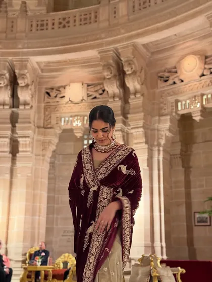 Modeling at a location like the Umaid Bhawan Palace requires a certain regality. Draped in a luxurious velvet saree, I embody the royal charm of the setting, making this a perfect feature for heritage brands and luxury occasion wear.