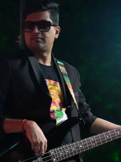 Our bassist in action during a Diwali Bash and a wedding event. We can handle back-to-back gigs with the same high energy.