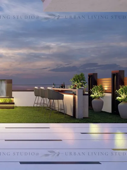 The bar and water feature area of the Ghaziabad terrace design. The combination of a waterfall and an outdoor bar adds both tranquility and a social element to the space.