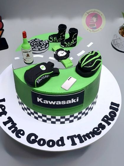 The final Kawasaki-themed cake with the message "Let The Good Times Roll."