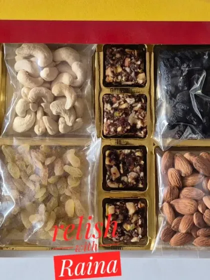 A custom Diwali gift hamper combining the best of both worlds. This box includes sections of fresh, crunchy dry fruits like cashews and almonds alongside my homemade dry fruit sweets, all packed and ready for the festival of lights.