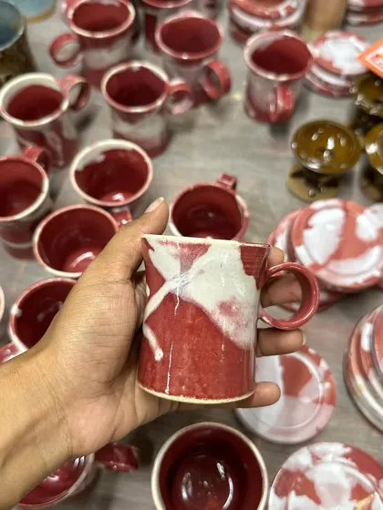 A larger mug from the Flamingo series, showcasing a different variation of the beautiful red and white glaze pattern.
