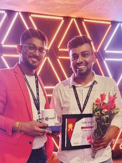 A proud moment, presenting an employee with a certificate and gifts for his two-year milestone. We are proud of the growth and dedication of our team members.