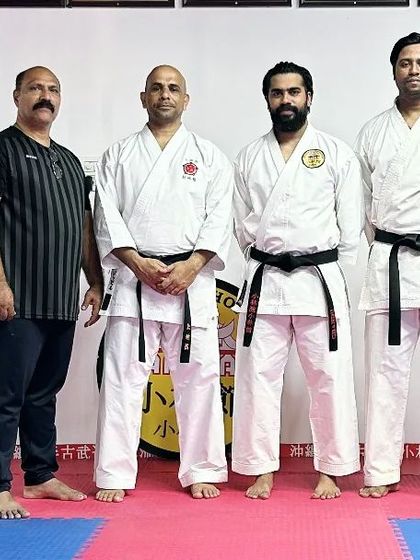 A formal group photo of the instructors who participated in the special Kobudo seminar.