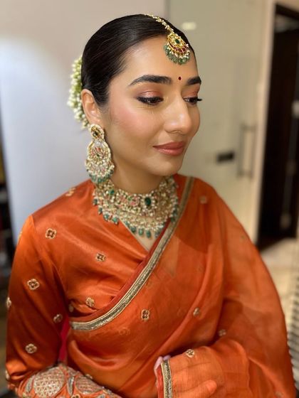 A final, beautiful shot of Hanita. Her serene expression and the soft, glowing makeup create a picture of pure elegance and grace.