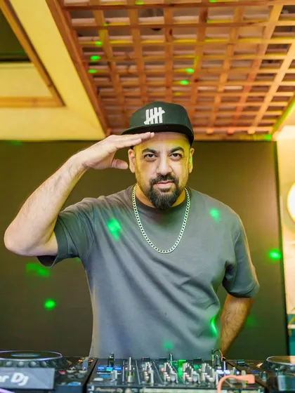 Saluting the crowd at Monkey Bar. It's a sign of respect for the energy you give me.