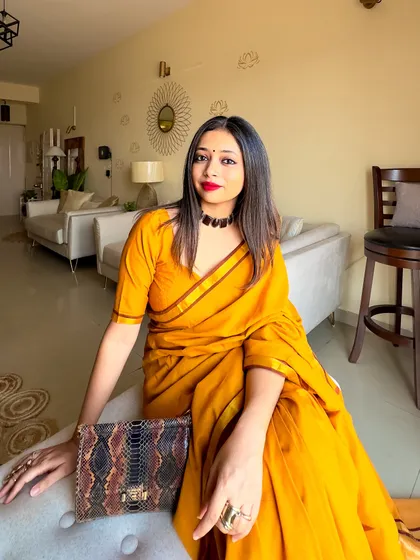 A confident pose with my yellow khadi saree. This look proves that you don't need to spend a lot to look and feel amazing.