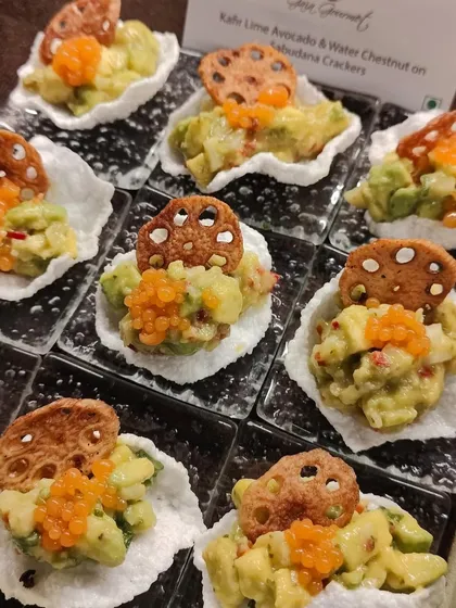 Kaffir Lime Avocado and Water Chestnut on Sabudana Crackers. This was a light, refreshing, and gluten-free canapé we created for one of Zoya Akhtar's parties, showcasing our ability to cater to all dietary needs.