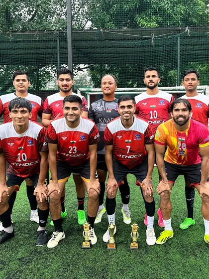 The team celebrating their victory at the Clash of Champions tournament.