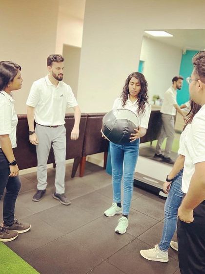 A team training session in progress. Our collective expertise and commitment to staying updated with the latest advancements mean better results for you.