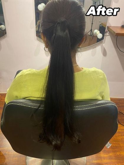 The 'after' shot of a client wearing one of my 100% human hair ponytails. It creates a sleek, long, and voluminous style that elevates your everyday look.