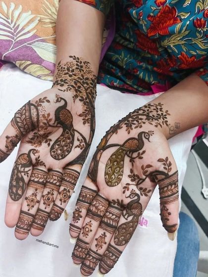 A unique and artistic design featuring peacocks perched on tree branches. This is a beautiful example of using nature as inspiration.