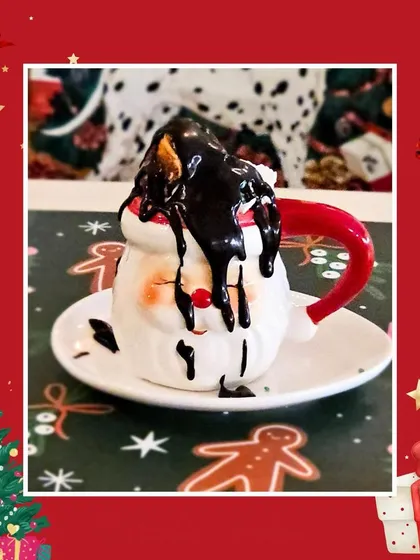 A little bit of chocolatey mess just adds to the fun. Our Santa mug gets a generous drizzle of chocolate sauce for an extra decadent hot chocolate experience.