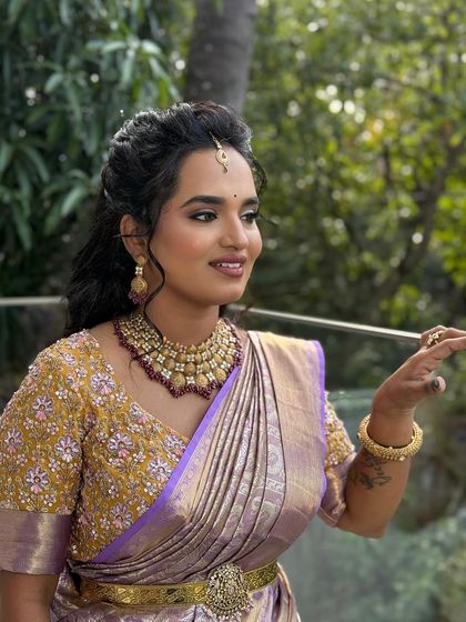 A portrait of my client, looking elegant and sophisticated. The makeup enhances her features beautifully.