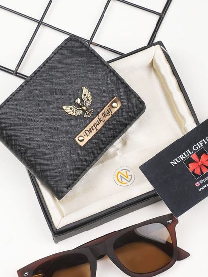 A personalized black wallet with an eagle charm, symbolizing strength and freedom.