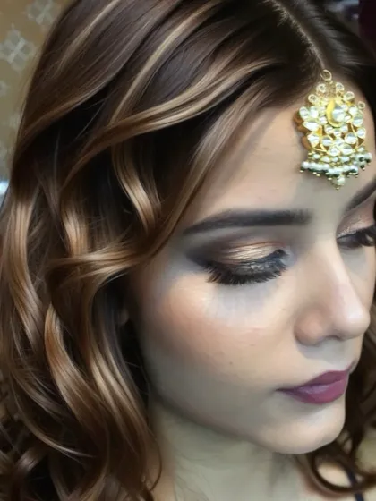 A close-up of a dramatic eye makeup look for a wedding function. This style combines a sharp winged liner with a blended smokey shadow and highlighted inner corners, perfect for making a statement.