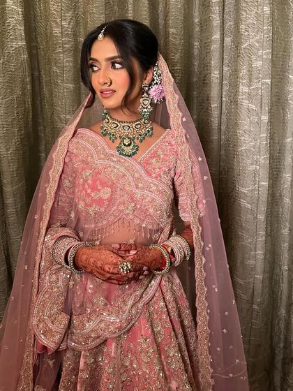 The side profile shows how the makeup, hair, and draping come together to create a picture-perfect bridal moment. We cover all these aspects in the portfolio session.