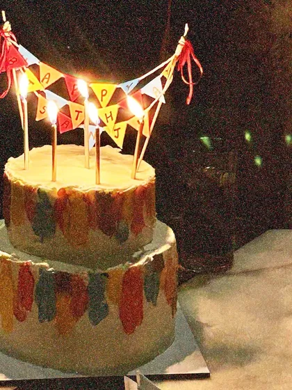I made this colorful two-tiered cake for my dad’s 55th birthday. He’s always been full of life, so I wanted his cake to feel joyful, soft, and full of love.