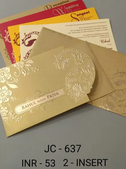 This gold-colored invitation features a beautiful paisley die-cut. The set includes festive inserts in yellow and red, making it a vibrant choice for your celebration.
