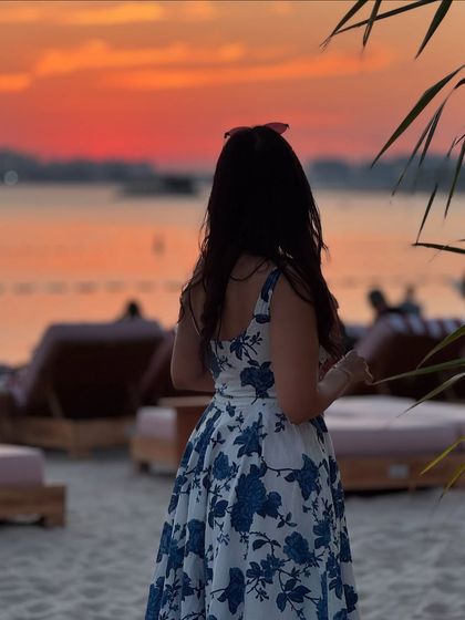 Watching the sunset in Dubai. The back of this dress is just as pretty as the front, a detail I always look for when styling.