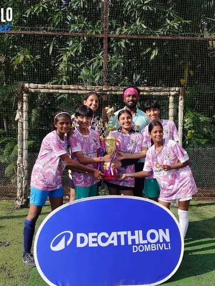 Our girls' team celebrating a well-deserved championship win at the Sparta X Decathlon League. We are incredibly proud of our dedicated girls' football program in Dombivli, creating a space for female athletes to thrive.