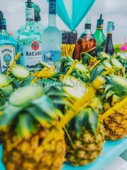 For a tropical-themed party, we served cocktails directly in hollowed-out pineapples. This not only looks fantastic but also infuses the drink with fresh, natural pineapple flavor.