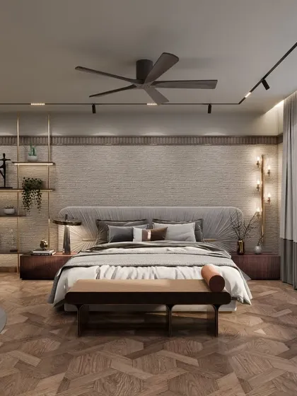 This master bedroom in Punjabi Bagh mixes timeless style with modern touches. The design features patterned wooden flooring, textured walls, and backlit shelving to create a minimalist yet classic luxury vibe.